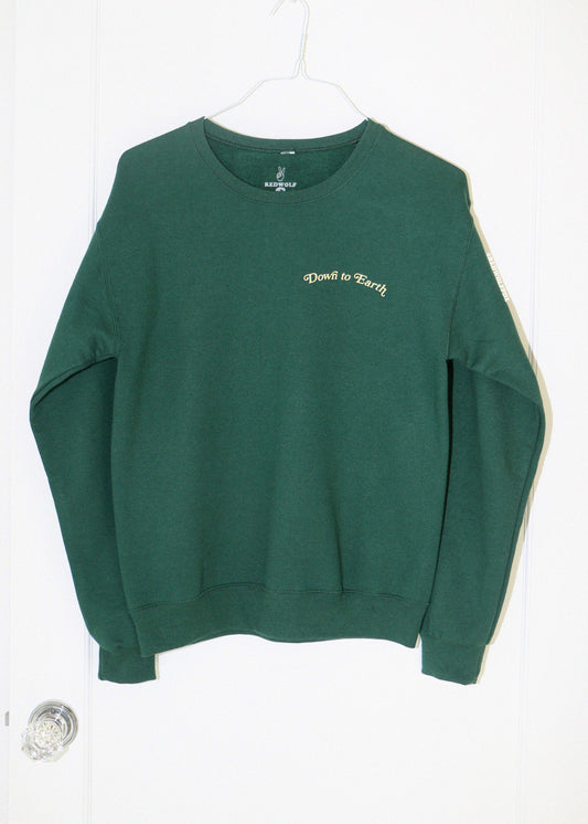 Green sweatshirt with text on a white background