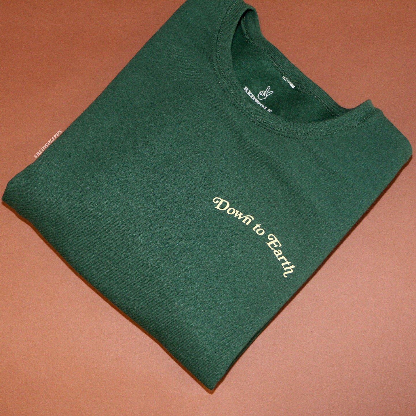 DOWN TO EARTH SWEATSHIRT