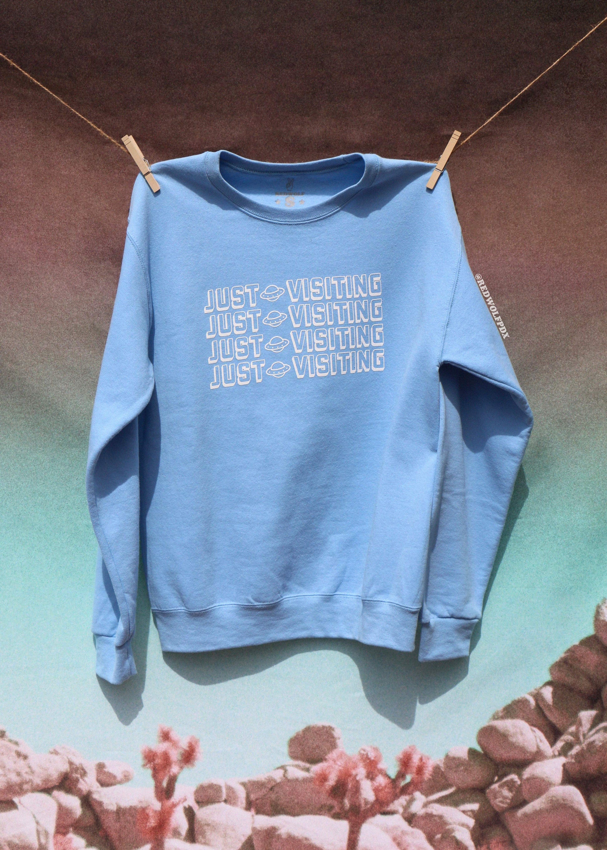 JUST VISITING GRAPHIC SWEATSHIRT - REDWOLF