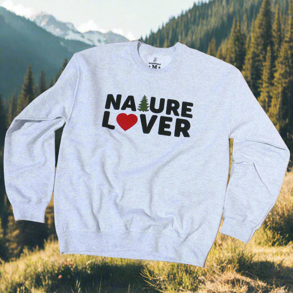 Gray sweatshirt with 'NATURE LOVER' text across front against a beige background