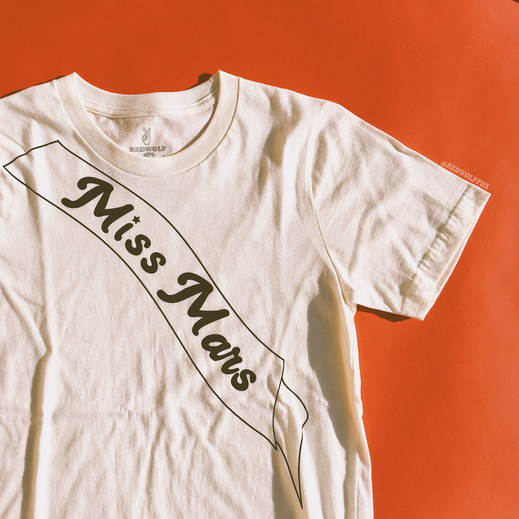 miss mars graphic on tee with retro red backdrop
